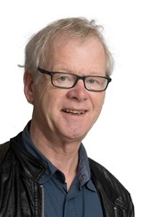 portret John Schrama