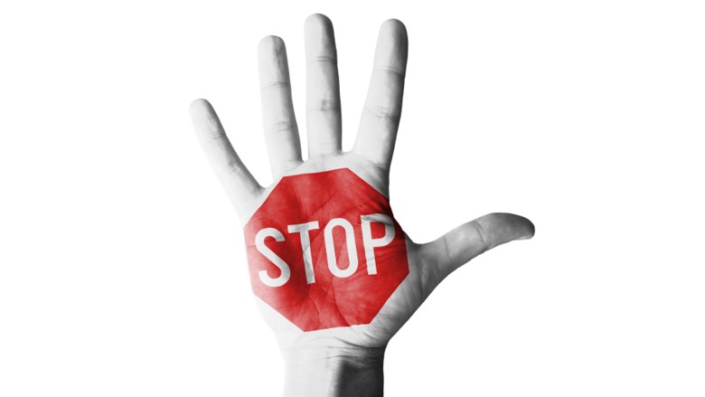 Hand met stop erop