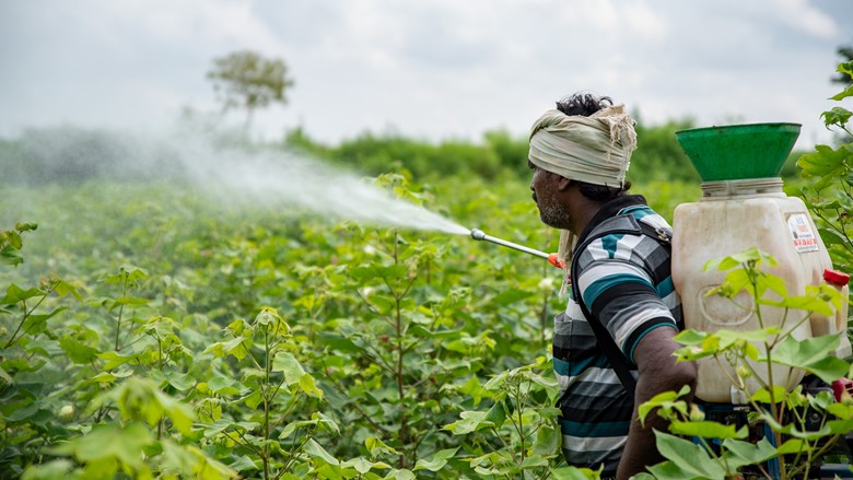 man spraying agro chemicals