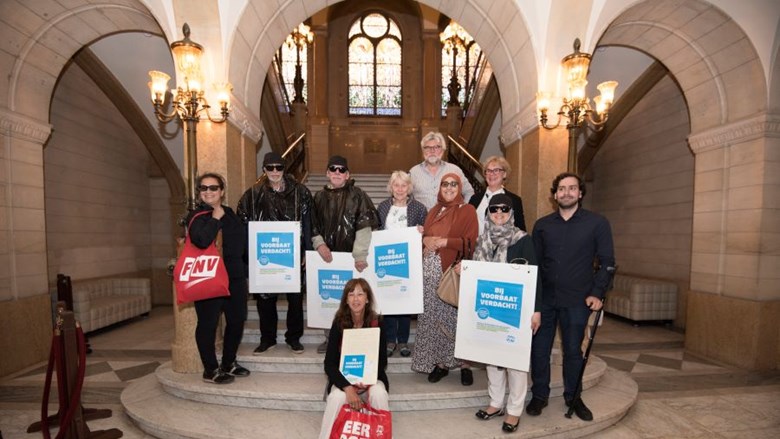 FNV-leden en buurtbewoners in actie