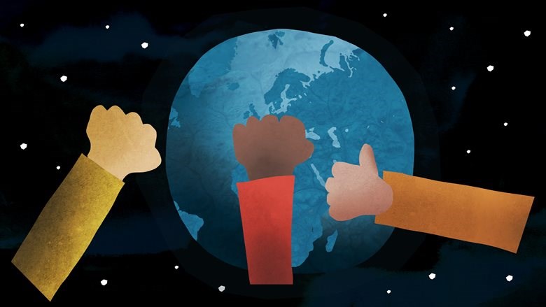 drie vuisten bij een wereldbol