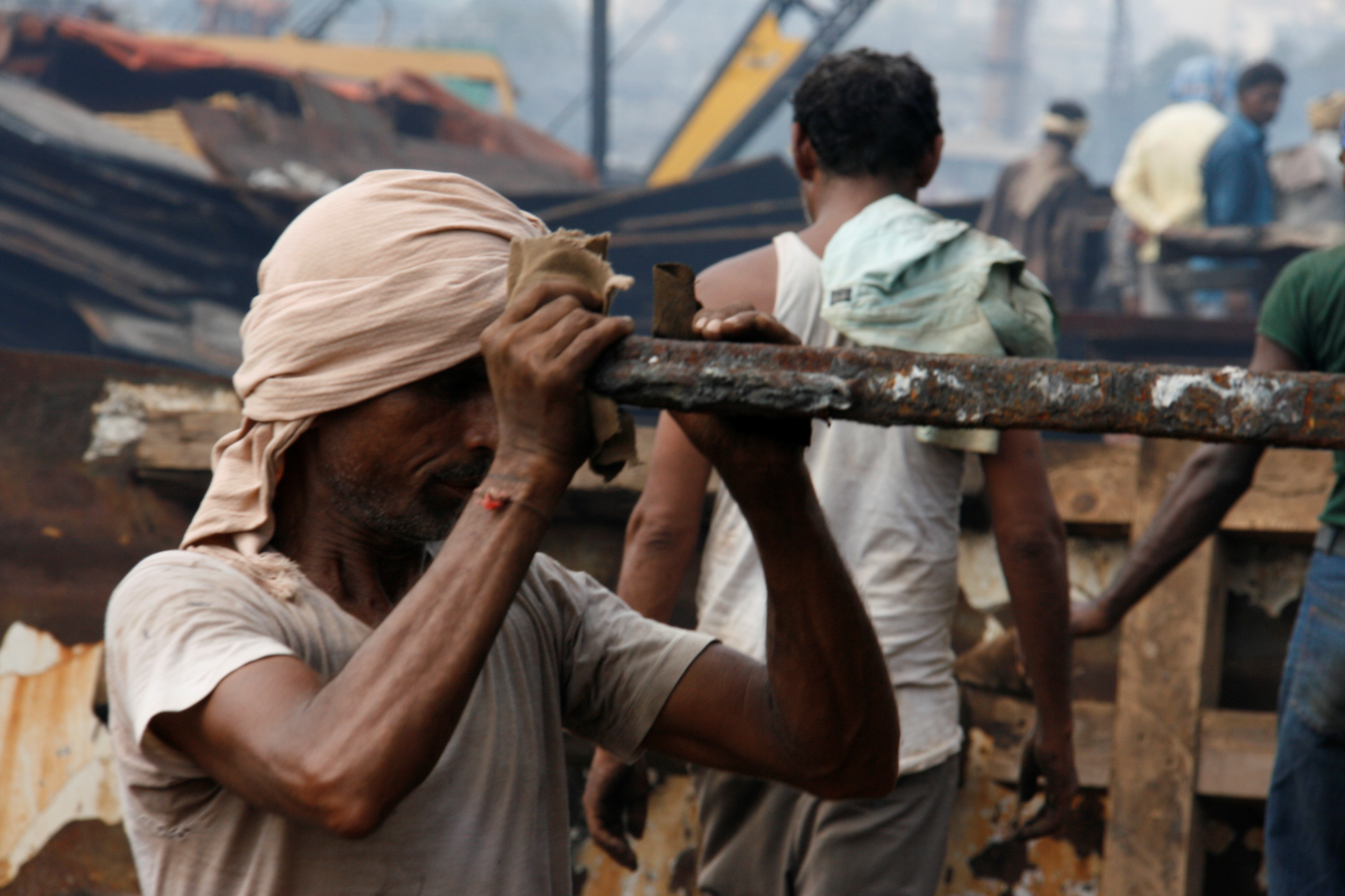 shipbreaker works with his bare hands